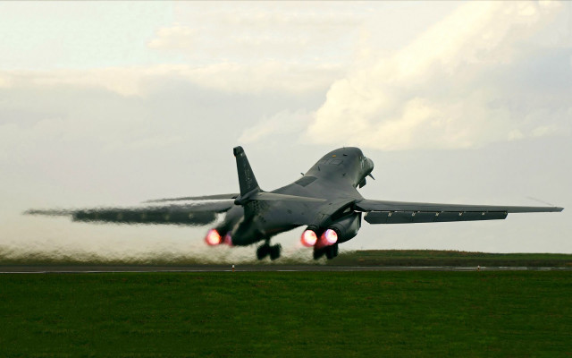 Jet plane takeoff smoke wings free wallpaper - medium preview image