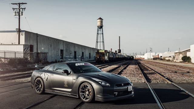 Silver car traintrack water tower free wallpaper - medium preview image
