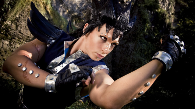 Woman cosplay sword rock tree free wallpaper - medium preview image
