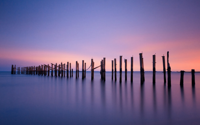 Poles water sunset purple sky free wallpaper - medium preview image
