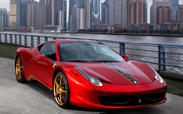 Red sports car cityscape river free wallpaper - medium preview image