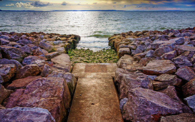 Stone wall walkway ocean cloudy free wallpaper - medium preview image