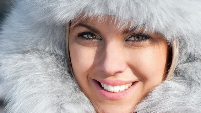 Woman furcoat smile white teeth free wallpaper - medium preview image