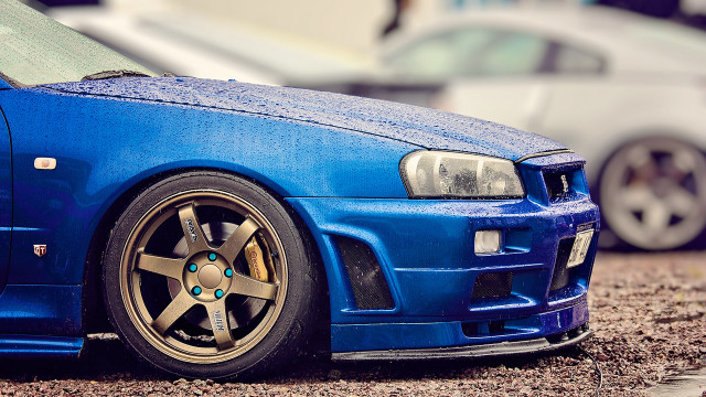 Blue car street clock tiltshift free wallpaper - medium preview image