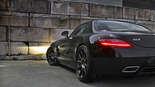 Black sports car brick wall #7 free wallpaper - medium preview image