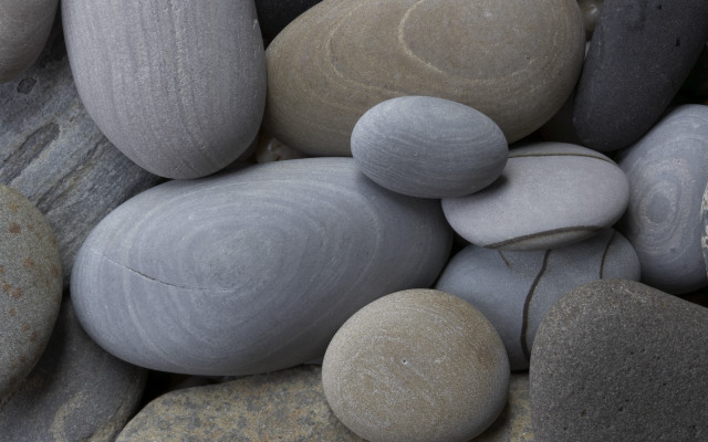 Pile rocks circular design grey free wallpaper - medium preview image