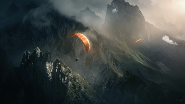 Paraglider mountain range cloudy sky free wallpaper - medium preview image