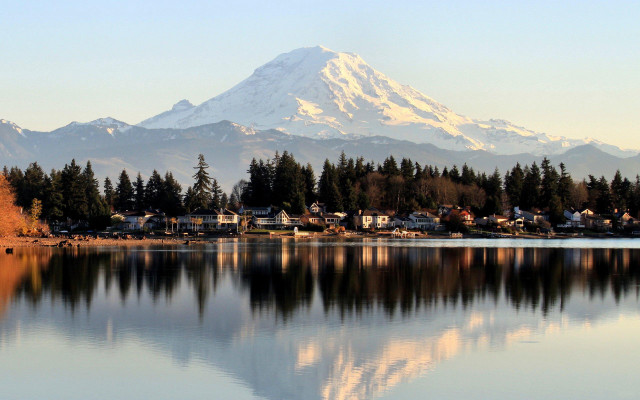 Mountain lake shore houses cityscape free wallpaper - medium preview image