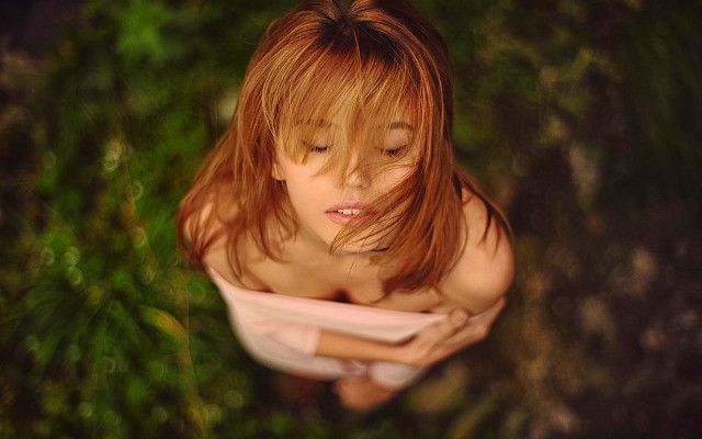 Red haired woman reading book free wallpaper - medium preview image