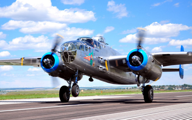 Propeller plane runway clouds precisionism free wallpaper - medium preview image