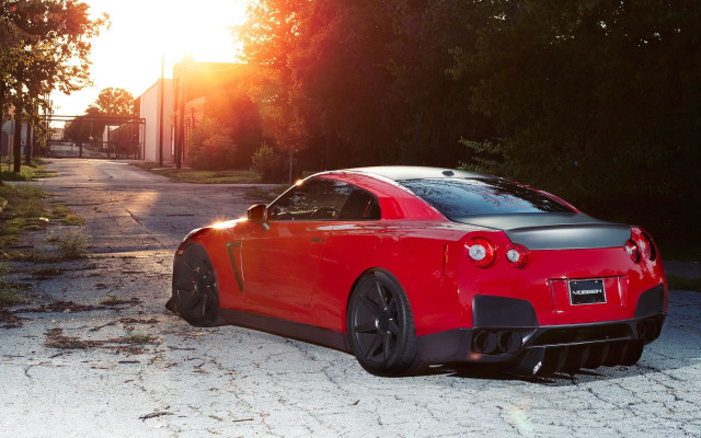 Red sports car sunset matte free wallpaper - medium preview image
