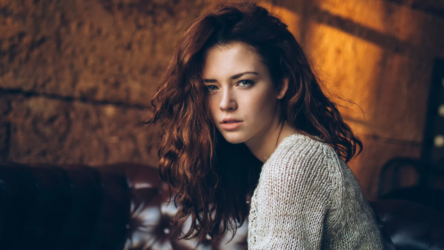 Woman long hair couch brick free wallpaper - medium preview image