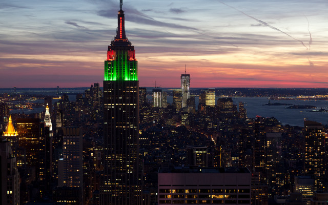 City skyline green red lit free wallpaper for desktop - medium preview image