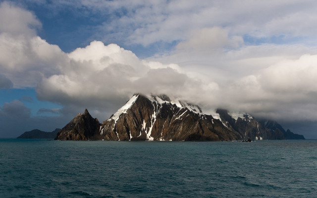 Mountain snow clouds lake ocean free wallpaper - medium preview image