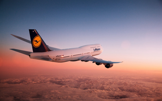 Large jetliner blue sky clouds #4 free wallpaper - medium preview image