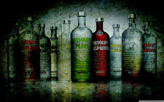 Liquor bottles table grungy background free wallpaper - medium preview image