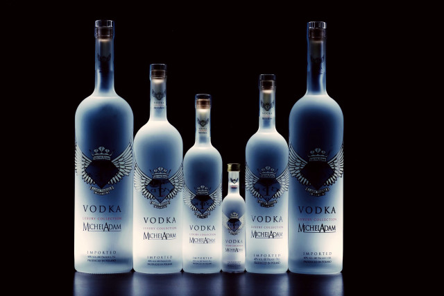 Vodka bottles table black background free wallpaper - medium preview image