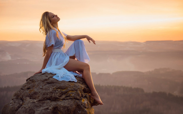 Woman rock sitting beach sunset free wallpaper - medium preview image