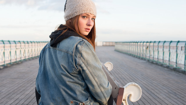 Woman denim jacket skateboard ocean free wallpaper - medium preview image
