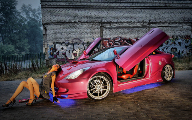 Woman sitting red sports car #3 free wallpaper - medium preview image