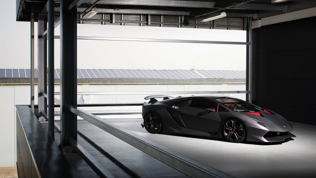 Black sports car garage solar free wallpaper - medium preview image