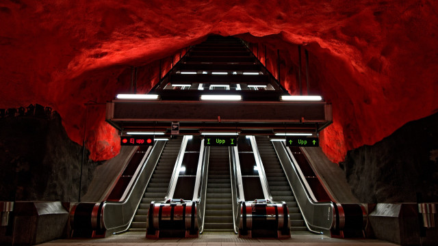 Subway escalators red walls tunnel free wallpaper - medium preview image