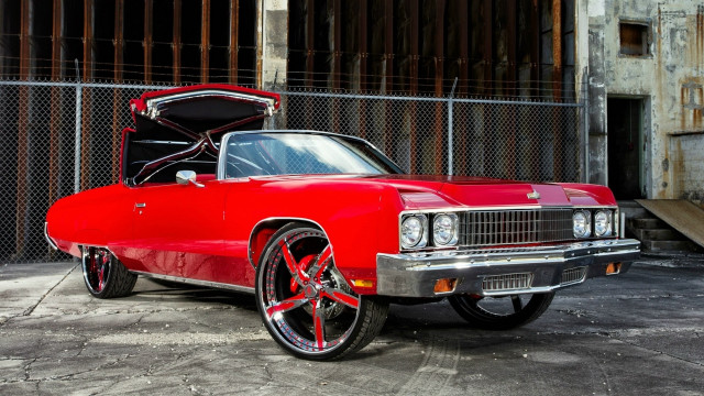 Red car fence open urban free wallpaper - medium preview image