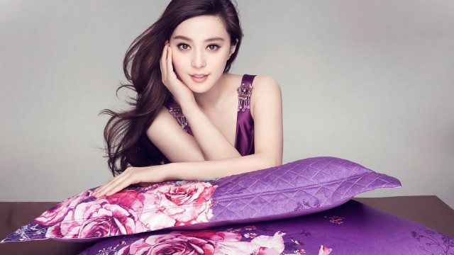 Woman purple flower pillow portrait free wallpaper - medium preview image