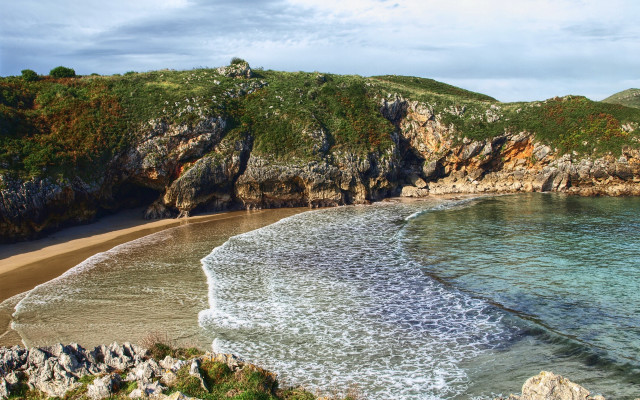Beach cliff water boat mountain free wallpaper - medium preview image