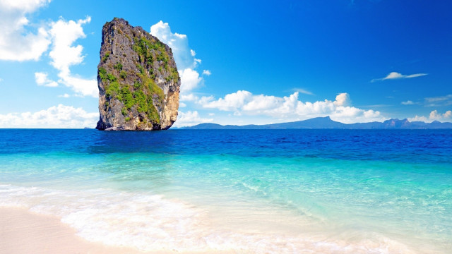 Rock ocean beach clouds sky free wallpaper - medium preview image