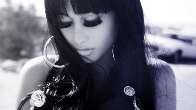 Woman black hair earrings phone free wallpaper - medium preview image