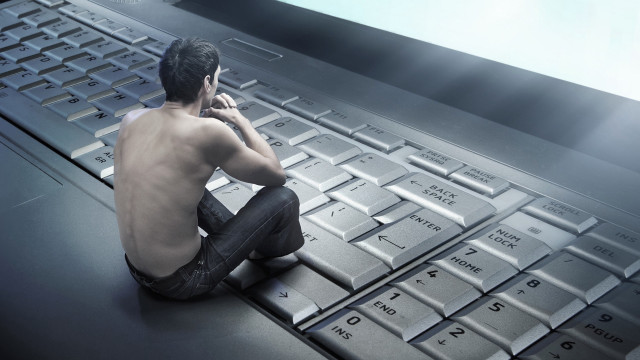 Man sitting keyboard phone boots free wallpaper - medium preview image