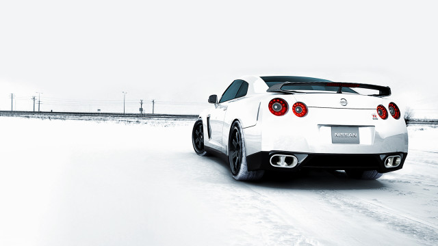 White sports car snowy road #3 free wallpaper for desktop - medium preview image
