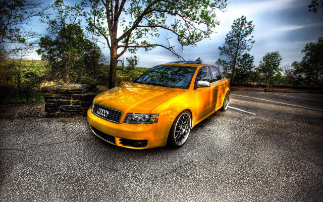 Yellow car autumn leaves fence free wallpaper - medium preview image