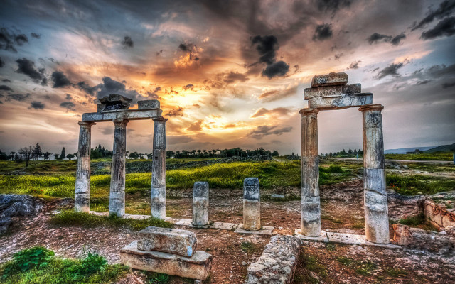 Stone pillars field cloudy sky free wallpaper - medium preview image