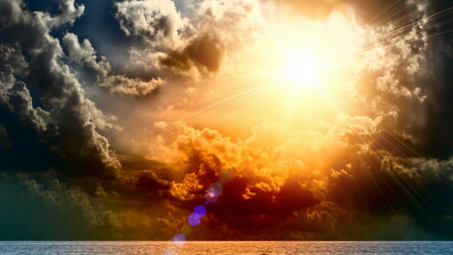 Bright sun clouds ocean boat #2 free wallpaper - medium preview image