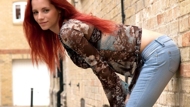Red hair woman brick wall free wallpaper - medium preview image