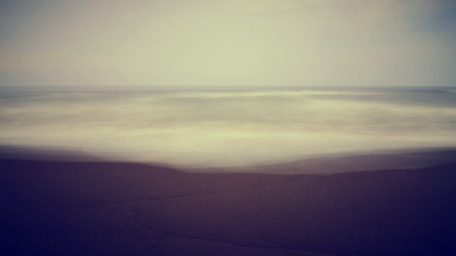 Blurry ocean beach wave sunset free wallpaper - medium preview image