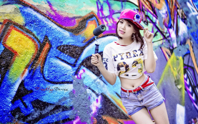 Woman baseballcap graffiti painting sprayer free wallpaper - medium preview image