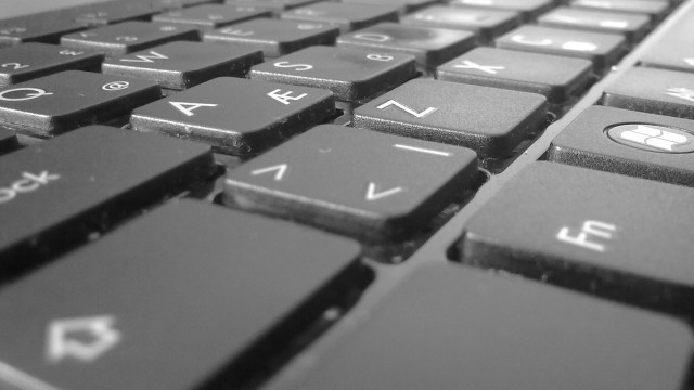 Keyboard macro blurry greyscale letters free wallpaper - medium preview image