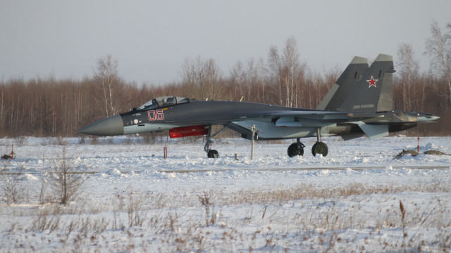 Fighterjet snowfield trees people puzzle free wallpaper - medium preview image