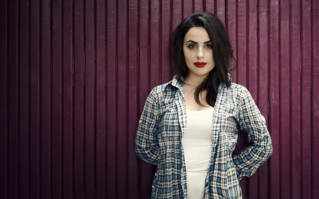 Woman purple wall hands on free wallpaper - medium preview image