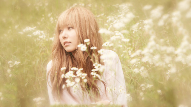 Woman longhair flowerfield serious aesthetic free wallpaper - medium preview image