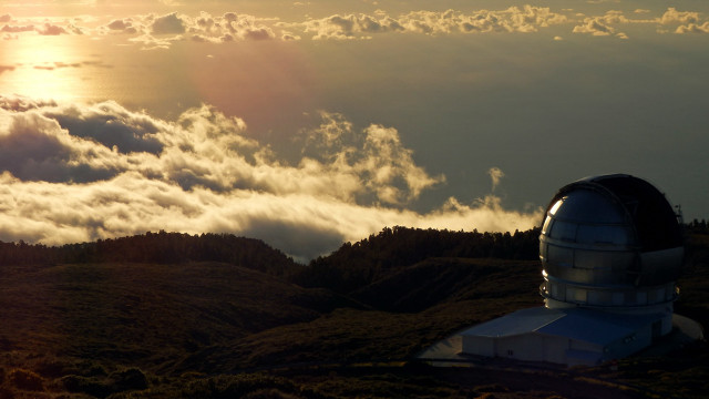 Telescope hill clouds sunset ocean free wallpaper - medium preview image