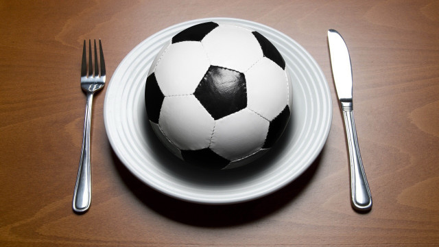 Soccer ball on plate with free wallpaper - medium preview image