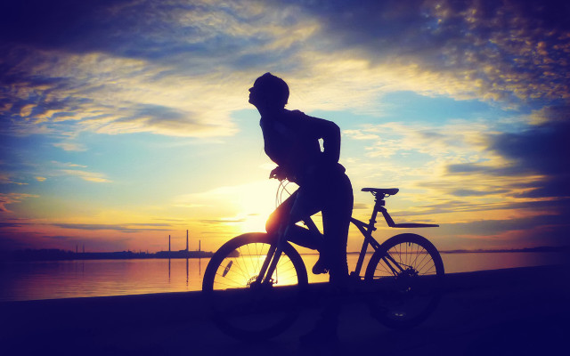 Beach biking sunset sky silhouette free wallpaper - medium preview image