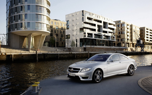 Silver car road water buildings free wallpaper - medium preview image