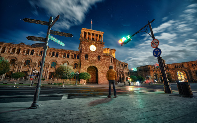 Man streetcorner trafficlight clocktower city free wallpaper - medium preview image