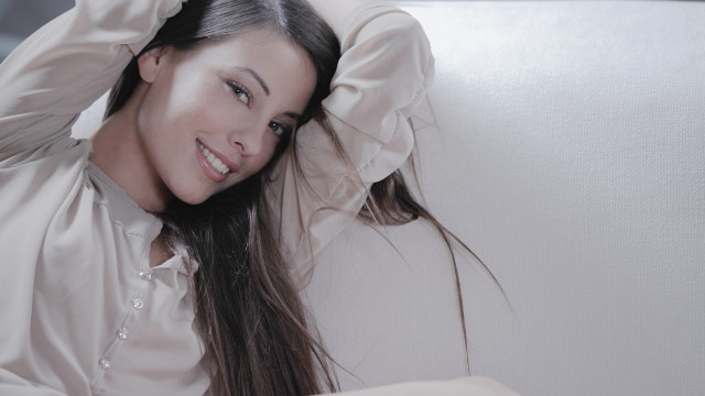 Woman couch ponytail laptop white free wallpaper - medium preview image