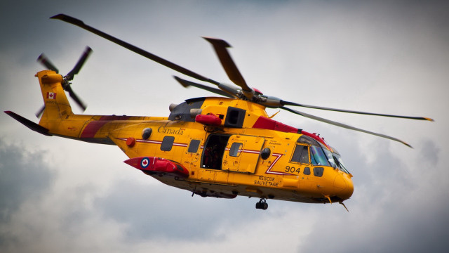 Yellow helicopter red nose cloudy free wallpaper - medium preview image